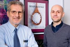 two men posing for an image