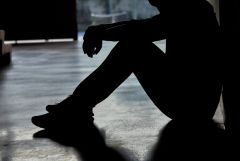 man sitting on ground